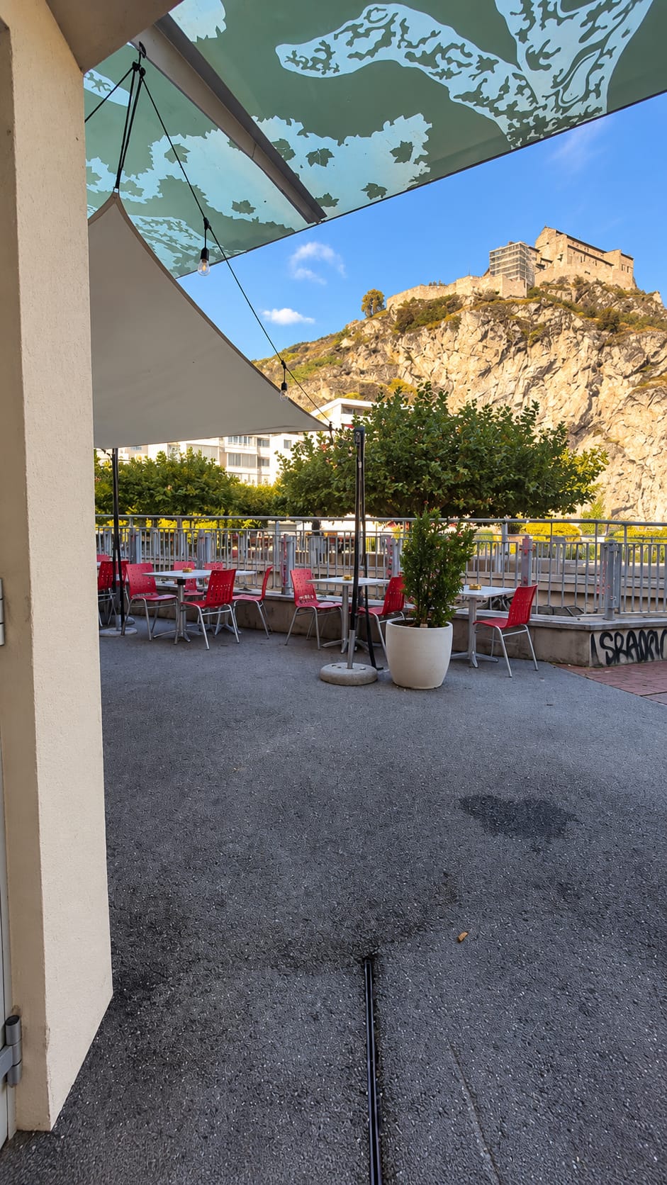 The Dugout Sports Bar terrace with a view of Valère Basilica, Sion